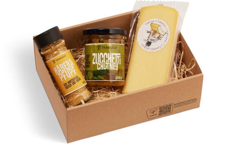 Raclette-Set im Karton: Raclettekäse, Husgwürz «Häberepfupf» und Zucchetti-Chutney